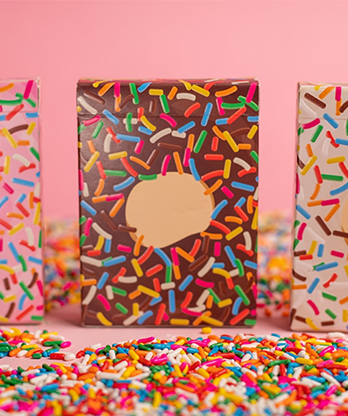 Papa Leon's Wicked Donuts (Chocolate) Playing Cards by Wounded Corner and Cam Toner